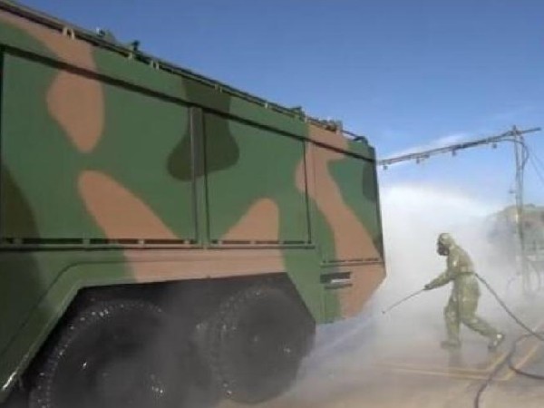 Xinjiang Armed Police Corps organised chemical defence forces and carried out anti-nuclear, biological and chemical combat drills.