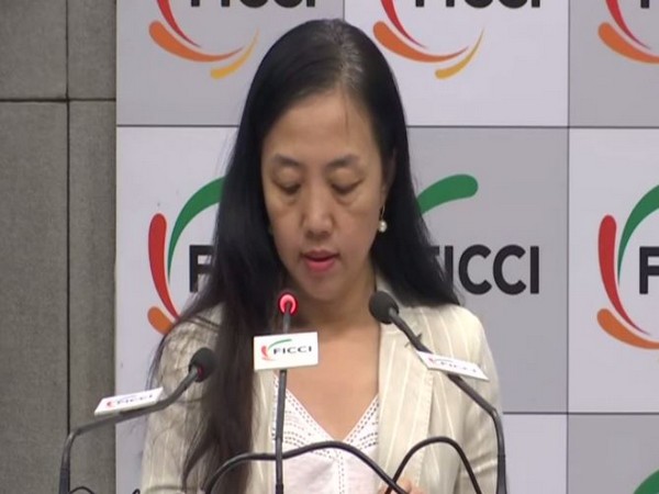 Zhu Xiaohong, Counselor, Embassy of China, speaking at the India-China Business Meeting & Signing Ceremony in New Delhi on Thursday.