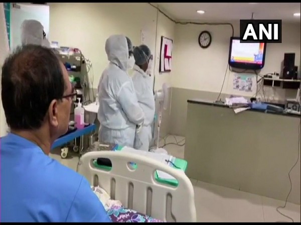 Madhya Pradesh Chief Minister Shivraj Singh Chouhan listening to PM Modi's Mann ki Baat in COVID-19 dedicated Chirayu Hospital. (Photo/ANI)