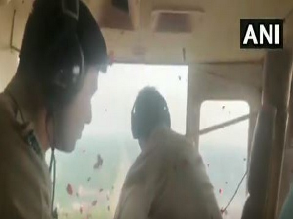 Police officials showered petals on Kanwar Yatris from chopper on Friday in Saharanpur 