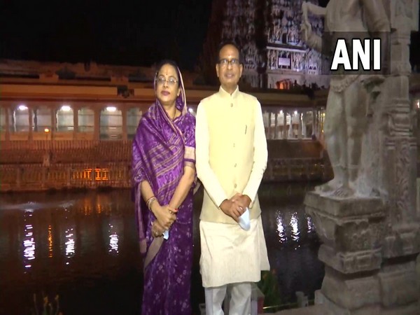 Madhya Pradesh Chief Minister Shivraj Singh Chouhan along with his wife at Meenakshi Amman Temple in Madurai, Tamil Nadu (Photo/ANI) 