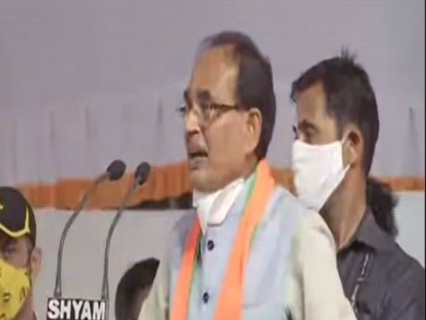 Shivraj Singh Chouhan addressing a public rally in Dabra. (Photo: ANI)