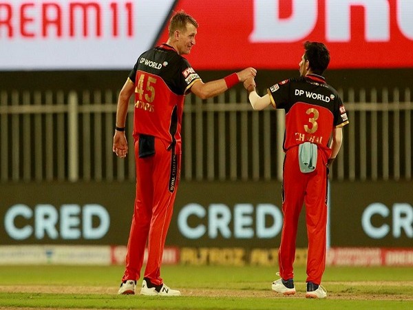 RCB bowlers Chris Morris and Yuzvendra Chahal (Image: BCCI/IPL)