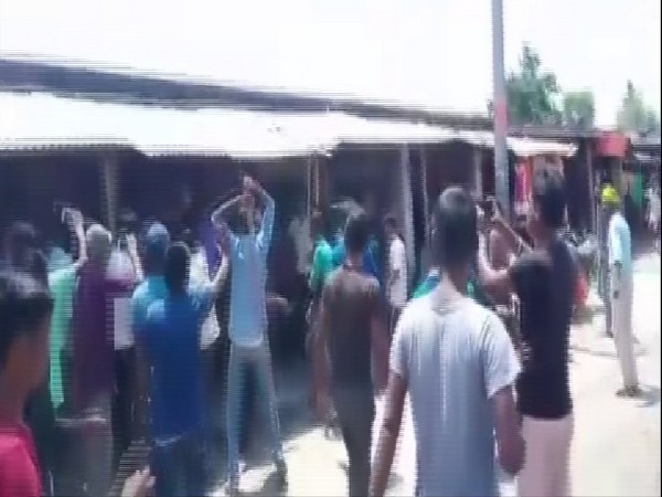 Locals protesting in Saharsa after killing of a young man on Monday. (Photo/ANI)