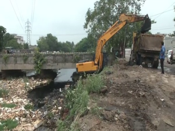Cleaning of the polluted Buddha Nullah being done in Ludhiana. (Photo/ANI) 