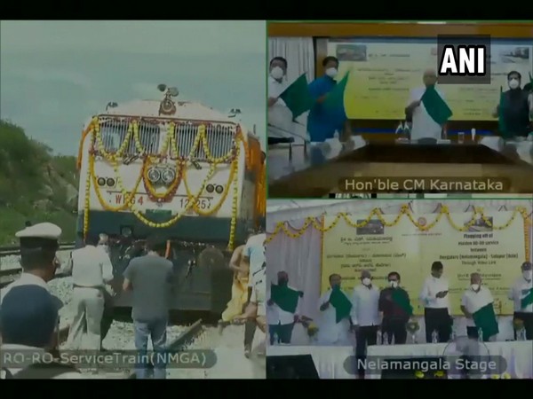 Karnataka CM BS Yediyurappa flagging off first-ever RORO train from Bengaluru to Solapur. (Photo/ANI)