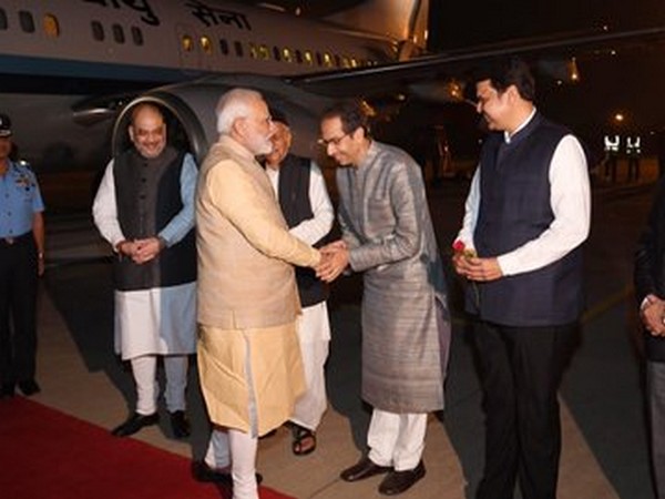 Maharashtra Chief Minister Uddhav Thackeray welcoming Prime Minister Narendra Modi at Pune airport on Friday. Home Minister Amit Shah is also seen. Photo/ANI