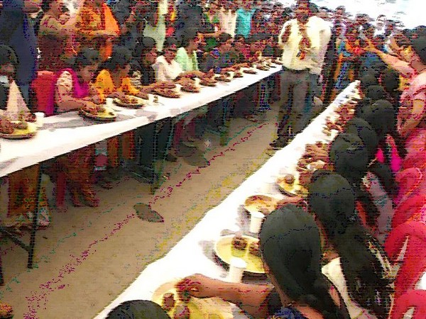 Women taking part in Ragi ball competition