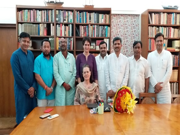 Congress president Sonia Gandhi with other leaders in New Delhi on Saturday. 