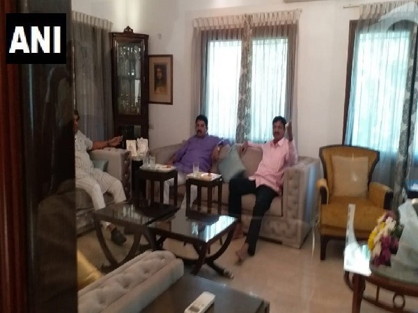 Congress MLAs Ramesh Jarkiholi and Dr Sudhakar meeting with BJP leader R Ashok in Bengaluru, Karnataka on Sunday Photo/ANI.