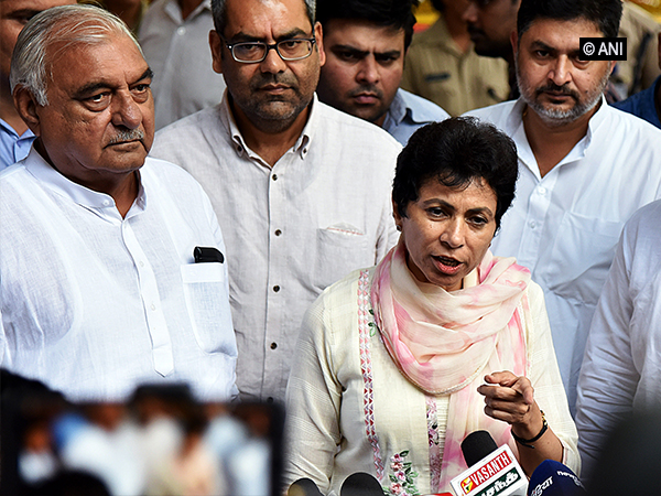 Haryana Congress leaders Kumari Selja and Bhupinder Singh Hooda talking to the media outside the Election Commission  on Tuesday. (Photo/ANI)  