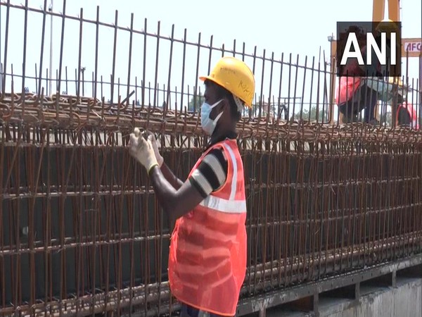 Workers doing work at the Kanpur Metro project site. (Photo/ANI)