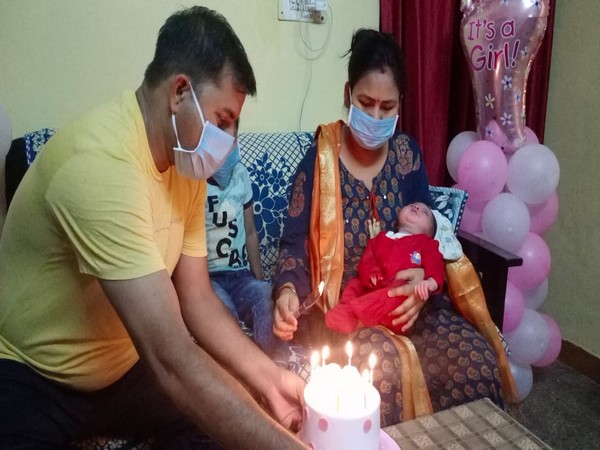 Constable Devender and his wife celebrating the birth of the newest member of their family. Photo/ANI