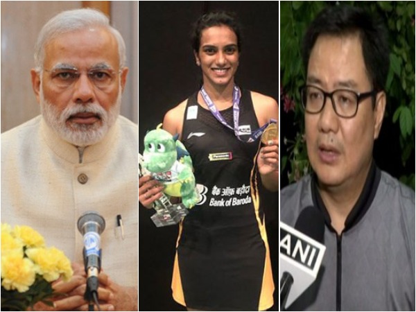 PM Narendra Modi, Shuttler PV Sindhu and Sports Minister Kiren Rijiju