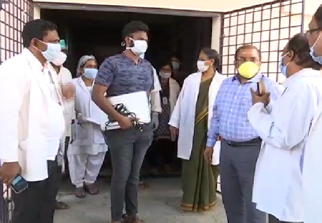 The COVID-19 patient getting discharged after treatment in Vijayawada, Andhra Pradesh on Saturday. 