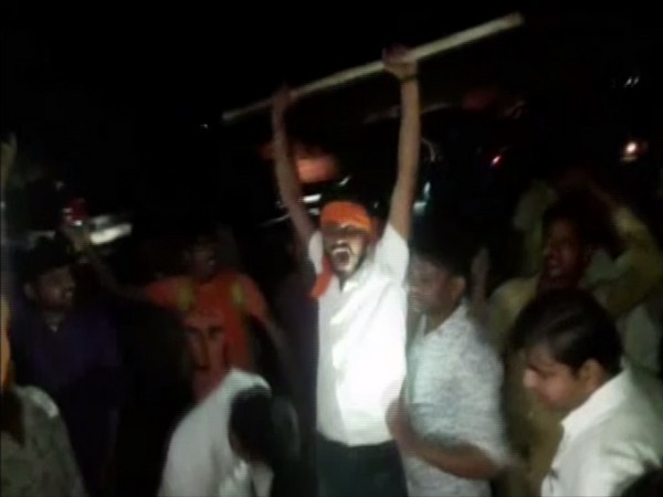 Vishwa Hindu Parishad and Bajrang Dal workers raising slogans outside the government school in Gwalior on Wednesday. Photo/ANI