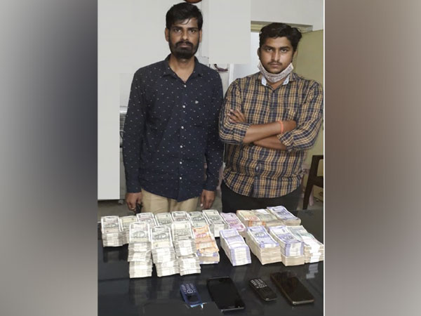 The two accused, identified as Manish Toshniwal and Vishnu Biradar, were found in possession of unaccounted cash and one Honda Activa in Hyderabad on Friday. (Photo/ANI)