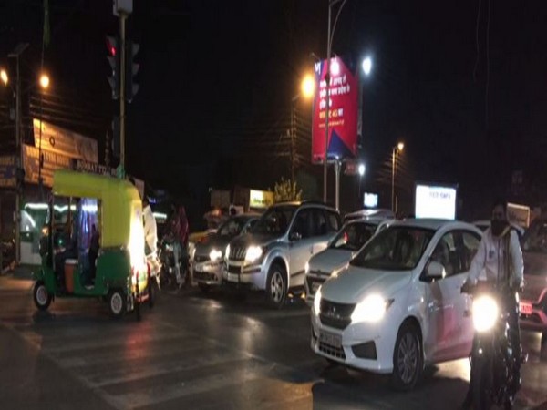 A bustling Indore city during night curfew on Saturday. (Photo/ANI)