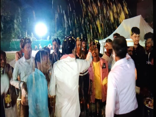 Tribals going to PM Narendra Modi's meeting in Bhopal were welcomed in Indore today. (Photo/ANI)