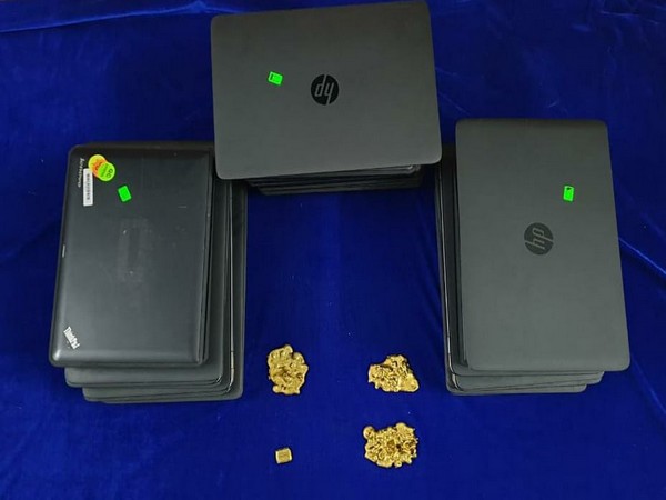 Gold and laptops recovered by the Customs department. Photo/ANI