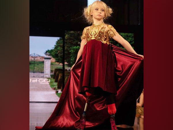 
    Nine-year-old double-amputee walks runway at NYFW
    