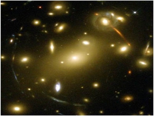 Gravity of clumps of dark matter can distort light from distant objects (Picture Courtesy: JPL-NASA)