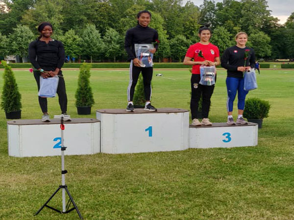 Indian sprinter Hima Das at the podium with the gold. (Photo/ Hima Das Twitter)