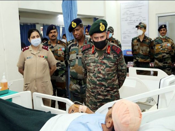 Visual of Lt Gen Upendra Dwivedi interacting with injured at 166 Military Hospital (Photo/ANI)