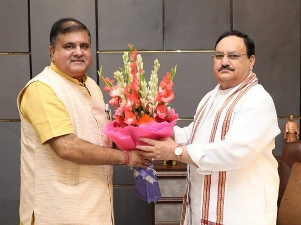 Former MLA from Badrinath Mahendra Bhatt with BJP chief JP Nadda (File Photo/ANI)