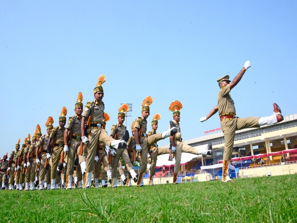Police personnel march past during the full dress rehearsal ahead of 77th Independence Day celebrations, at Guru Gobind Singh stadium, in Jalandhar on Sunday (Photo/ANI)