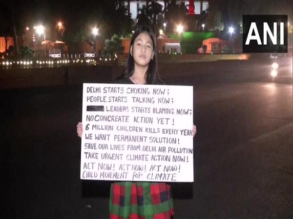 The nine year-old girl staging a protest in Delhi regarding air pollution. Photo/ANI