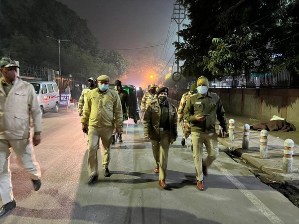 Officials of Delhi police holding foot patrolling on Tuesday. (Photo/ANI)