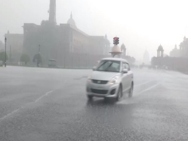 Rain lashed over Vijay Chowk on Sunday. [Photo/ANI]