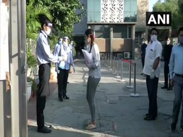 Candidates arrive at Arwachin Bharti Bhawan Senior Secondary School in Vivek Vihar, designated as an examination centre for JEE Main. [Photo/ANI]