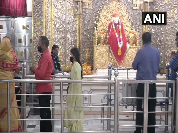 People praying at Sai Baba Mandir in Delhi on Diwali