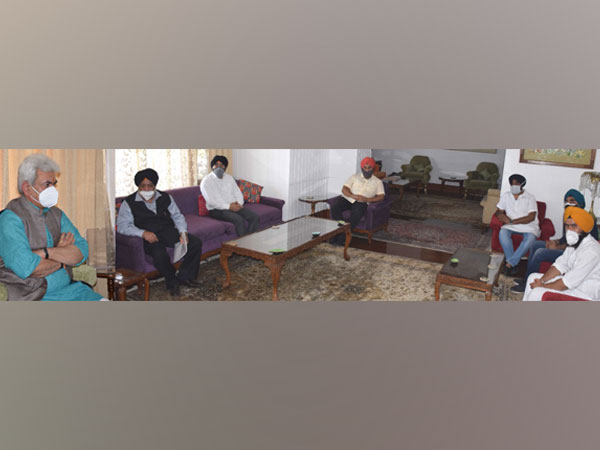 Delegation of SADD calls on J-KLt Governor Manoj Sinha. (Photo/ ANI)