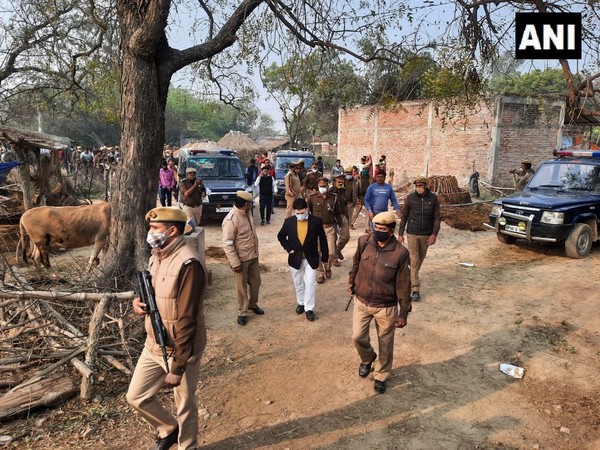 UP Police and local administration at last rites site on Friday. (Photo/ANI)