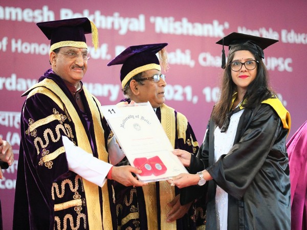 Union Education Minister Ramesh Pokhriyal Nishank awarding degree to a  DU student during annual convocation on Saturday. (Picture source: Twitter/Dr Ramesh Ramesh Pokhriyal Nishank)