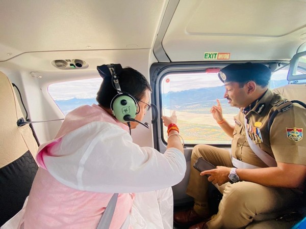 Uttarakhand CM Pushkar Singh Dhami conducting aerial survey of rain affected areas today (Photo/ANI)