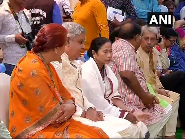 Governor Jagdeep Dhankar and CM Mamata  Banerjee during a puja in Kolkata on Sunday. Photo/ANI