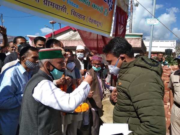 Dehradun District Magistrate received a warm welcome from the villagers. (Photo/ANI)