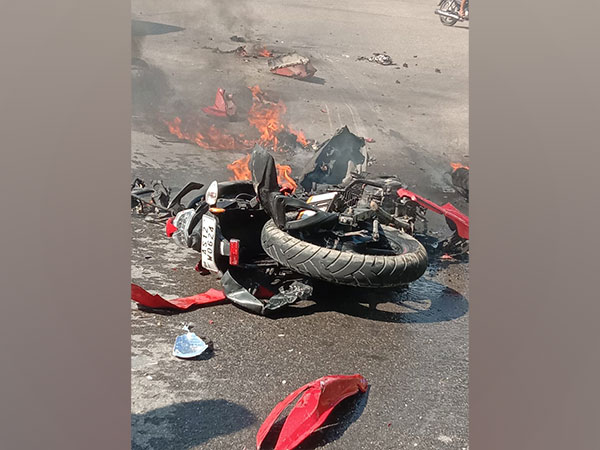 The motorcycle after it caught fire. (ANI/photo)