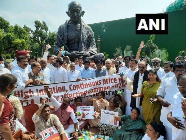 Joint Opposition protest in front of the Mahatma Gandhi statue in Parliament on the issues of price rise and inflation, on the third day of Monsoon session (Photo/ANI)