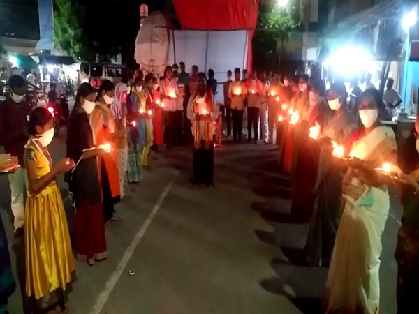 A candle-light protest was held by the BJP and JSP against the series of attacks on temples in the state. (Photo/ANI)