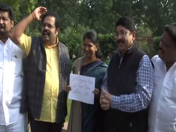 DMK MPs protest in front of Mahatma Gandhi statue in Parliament premises demanding release of National Conference leader Farooq Abdullah. [Photo/ANI]