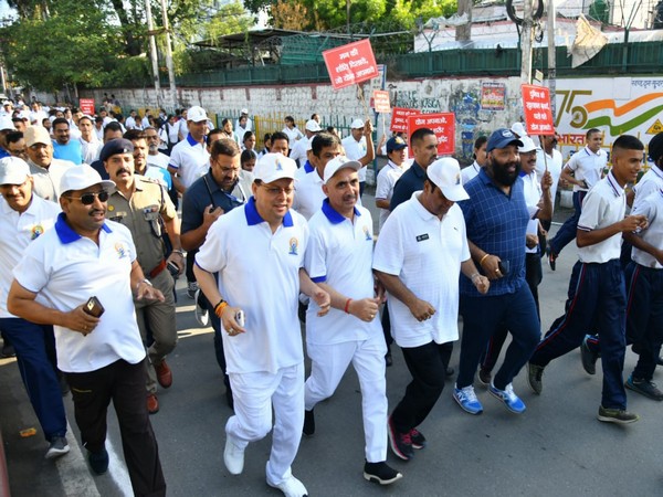 Uttarakhand Chief Minister Pushkar Singh Dhami participates in the 'Run for Yoga' program in Dehradun on Monday.
