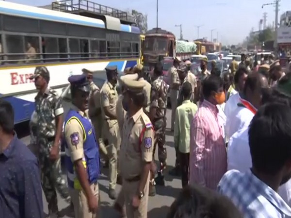 Police removing protestors from Highway in Hyderabad.