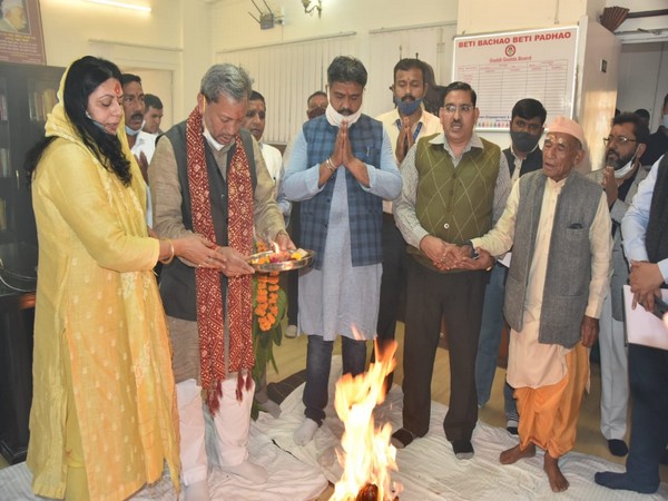 Uttarakhand CM Tirath Singh Rawat performing a puja in his office on Sunday.