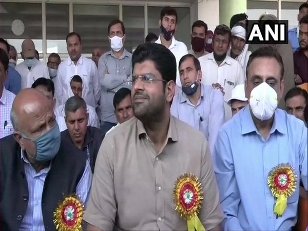 Deputy Chief Minister Dushyant Chautala speaking to reporters in Rohtak on Sunday. (ANI)