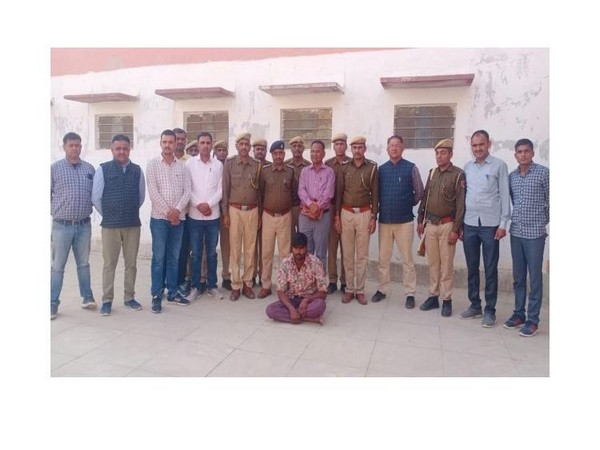 The arrested (on the floor) with Rajasthan police and ATS team.